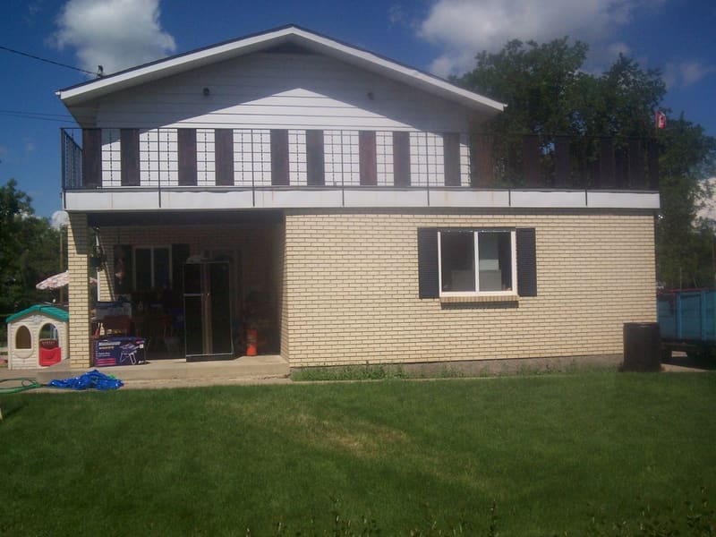 Split-level home exterior with a sloped roof