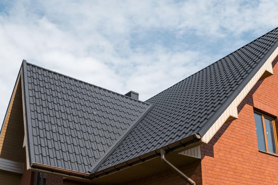 Dark roof on a brick house